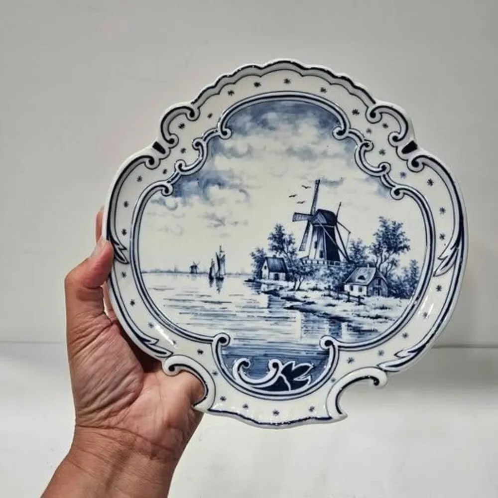 Blue and white windmill decorative plate